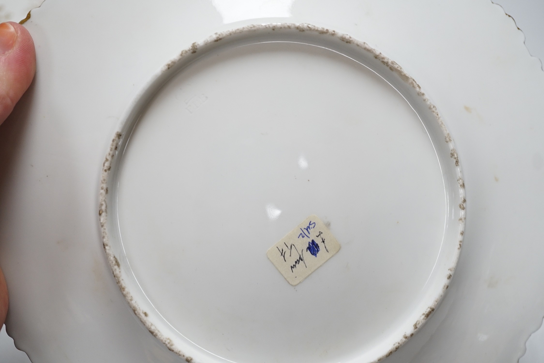 A Chamberlain's Worcester floral plate, and three Barr Flight & Barr plates, largest 22.5 cm